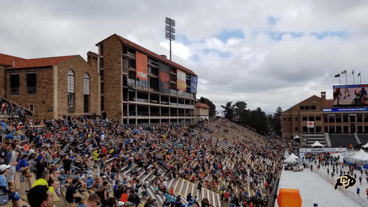 Long view of the large six-story press box occupying a substantial portion of the west sideline